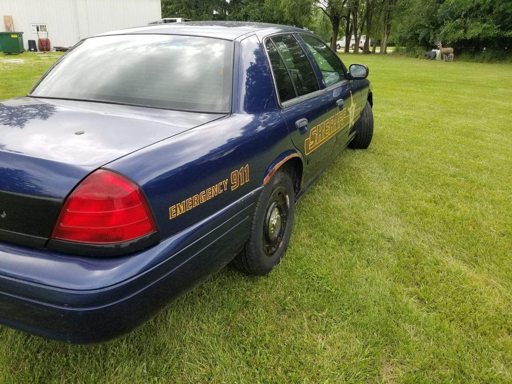 photo of the passenger side of the crown vic