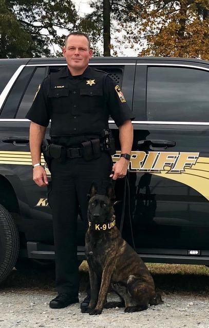 Photo of Deputy Harlan and K9 Juri.