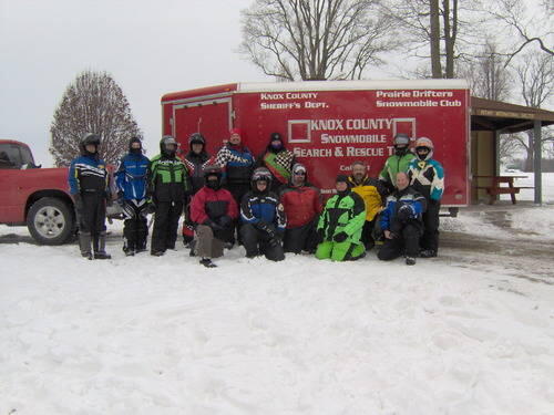 snow mobile search and rescue team picture